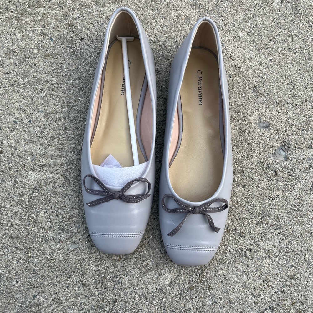 C. Paravano light blue flats